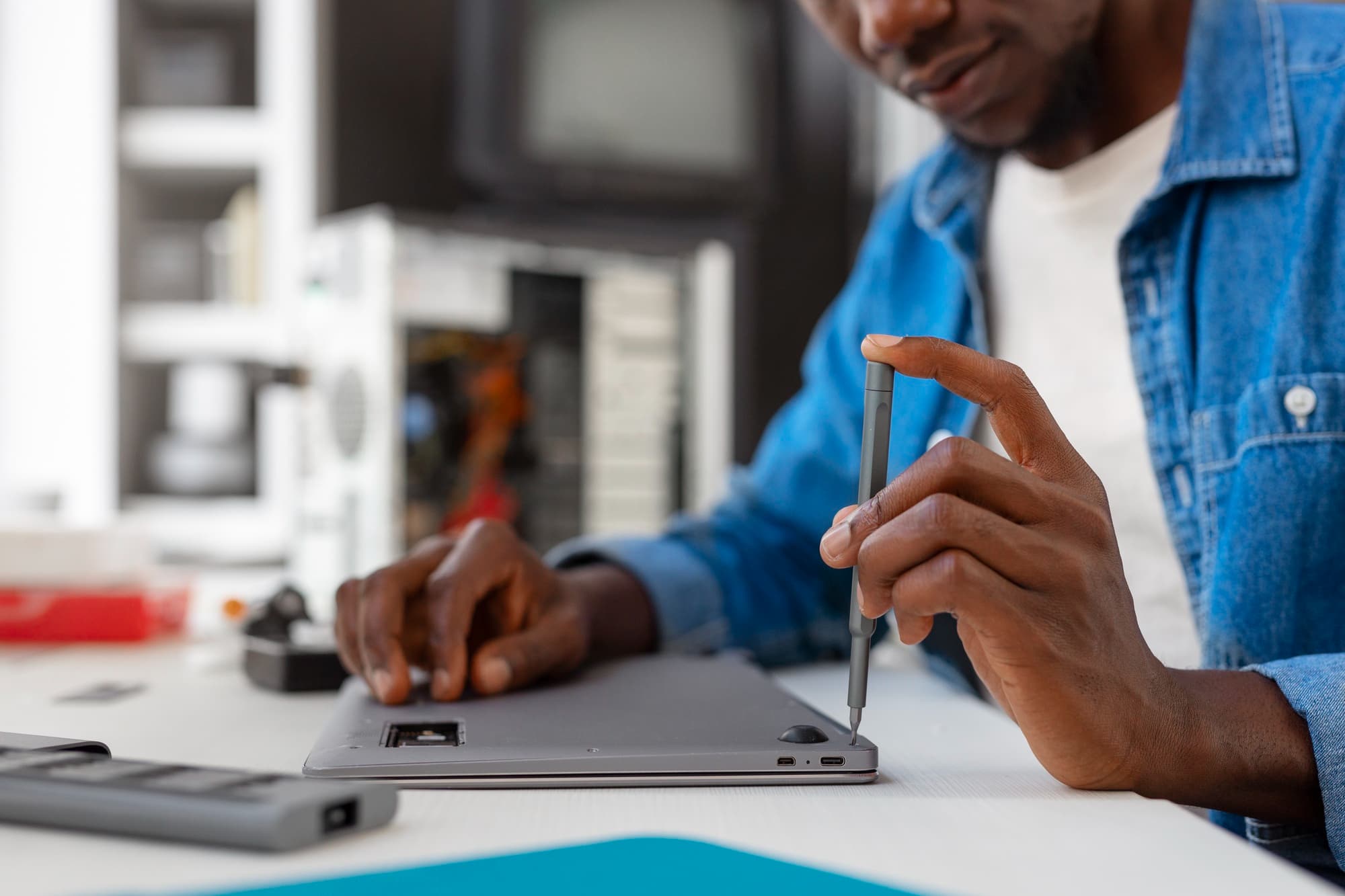 Technician repairing an electronic device
